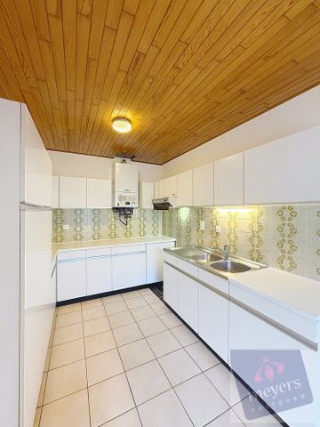 Ruim appartement met 2 slaapkamers en garage - Photo 2