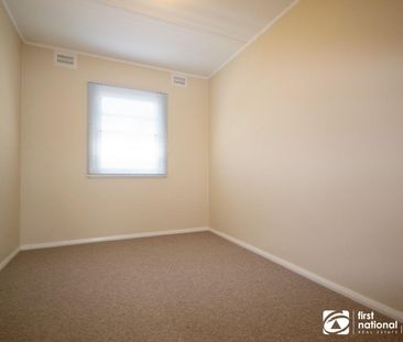 COMFORTABLE FAMILY LIVING ON A GENEROUS BLOCK - Photo 6