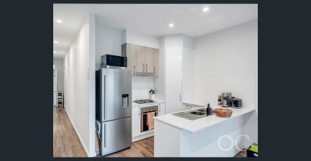 Open The Door to Contemporary Living With Effortless Style - Photo 3