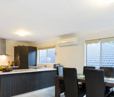 “Modern Family Home in Leafy Springfield Lakes” - Photo 6