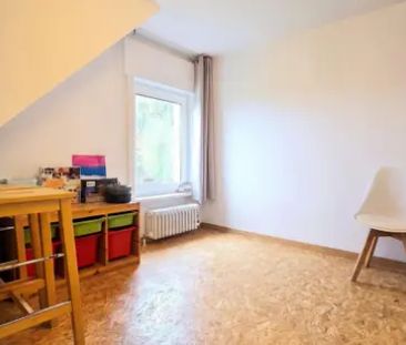 Sfeervol duplexappartement met terras en 1 parking. - Foto 4