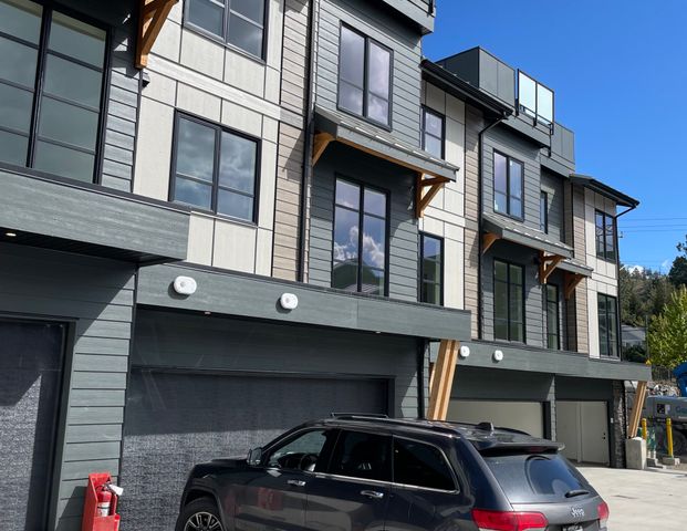Wonderful 3Bed, 2.5Bath, + Den 2 year old Townhouse in Glenmore - Photo 1
