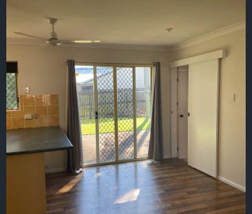 This neat and tidy low-set home offers comfortable coastal living i... - Photo 3