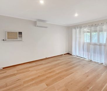 Comfortable Family Home with Character and Convenience - Photo 1
