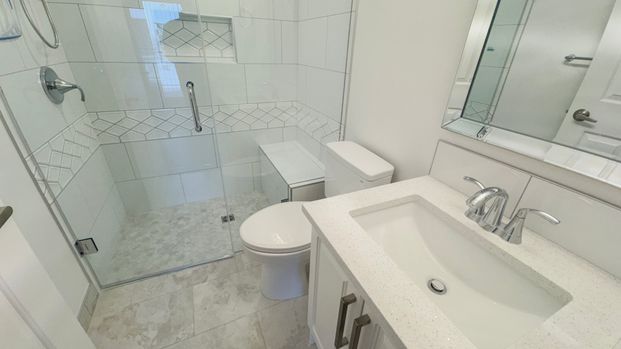 Stunning Fully Renovated Home With Walk In Shower & Soaker Tub In Millrise - Photo 1