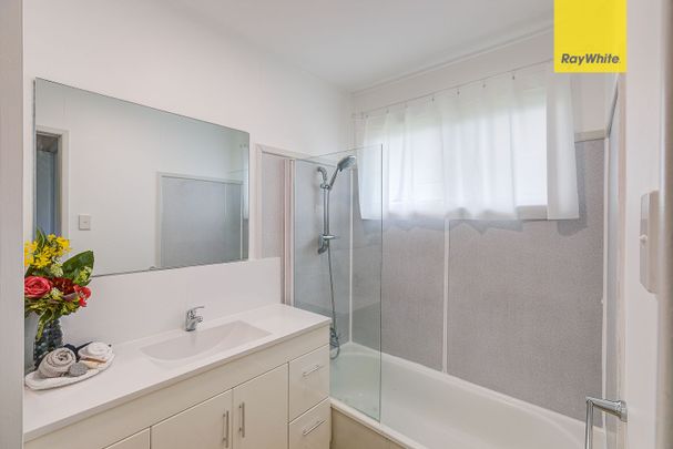 High Set Family Home in Great Location! - Photo 1