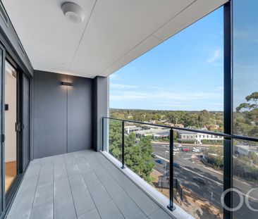 Open the Door to Top-Floor Luxury with Sweeping City & Coastal Views - Photo 4
