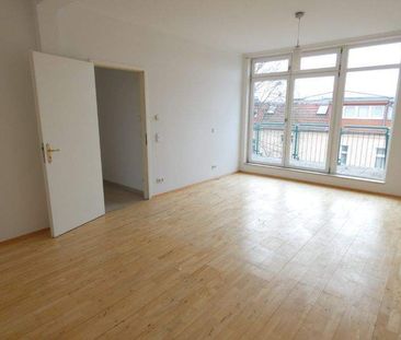 Wunderschöne DG-Wohnung mit großer Terrasse! - Photo 1