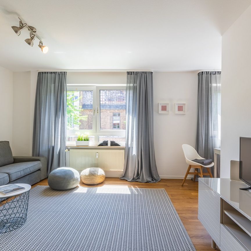 City-Residence: Sanierte und gut möblierte 2-Zi.-Wohnung mit Balkon nahe Skyline-Plaza - Foto 1