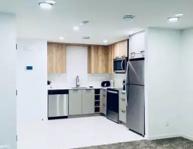 1 BEDROOM BASEMENT SUITE | 61 Edith Manor NW, Calgary - Photo 1