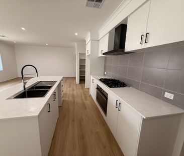 Brand New 4x2 Family Home in Sought-After Ravenswood - Photo 5