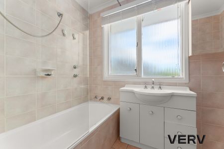 DELIGHTFUL THREE-BEDROOM HOME - Photo 5