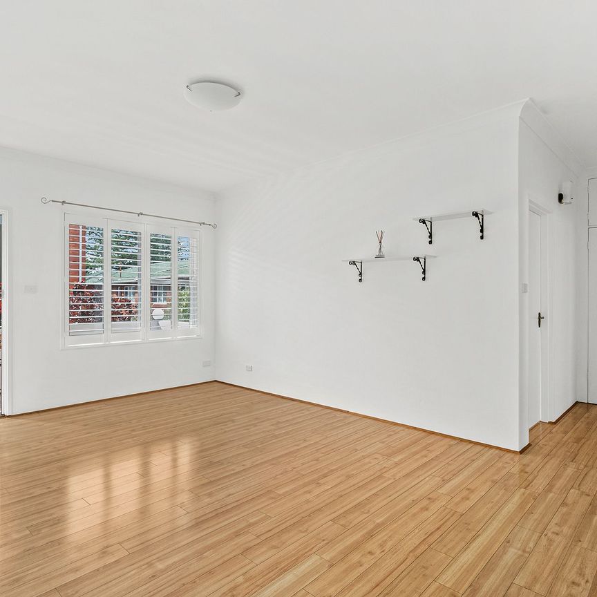 First-Floor Beachside Apartment with Style and Convenience - Photo 1