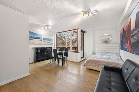 Situated in a secure development near St James's Park, London. This property offers bright and generous living space, an open-plan kitchen, a private balcony, private parking. - Photo 4