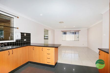 “Welcome to your New Home - Room for the Extended Family with an Entertainment Area and your very own Bar Area.” - Photo 5