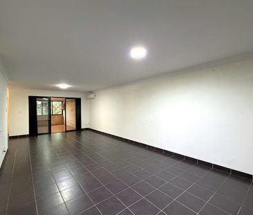 ELEVATED UNIT IN A CENTRAL LOCATION - Photo 2