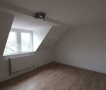 Kleine Dachgeschosswohnung in zentraler und doch ruhiger Lage - Photo 5