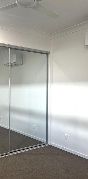 BRAND NEW modern and spacious three-bedroom duplex home. - Photo 1