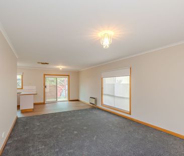 Charming 2 Bedroom Townhouse in a Convenient Location - Photo 1
