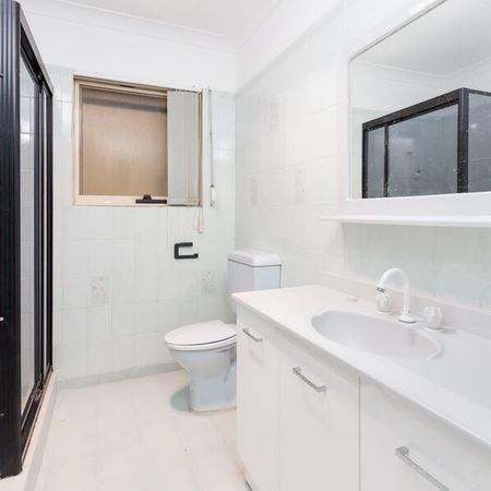 Stylishly Renovated 3-Bedroom Home - Photo 3