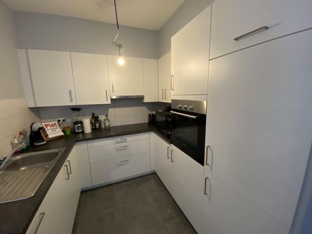 Goed gelegen appartement met twee slaapkamers en een zonnig terras. - Photo 3