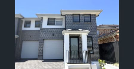 Brand New Four Bedroom Duplex in Sought After Location - Photo 4