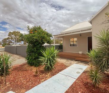 Charming Home with Large Yard + Shed - Photo 2