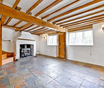 Attractive character cottage in idyllic village setting - Photo 1