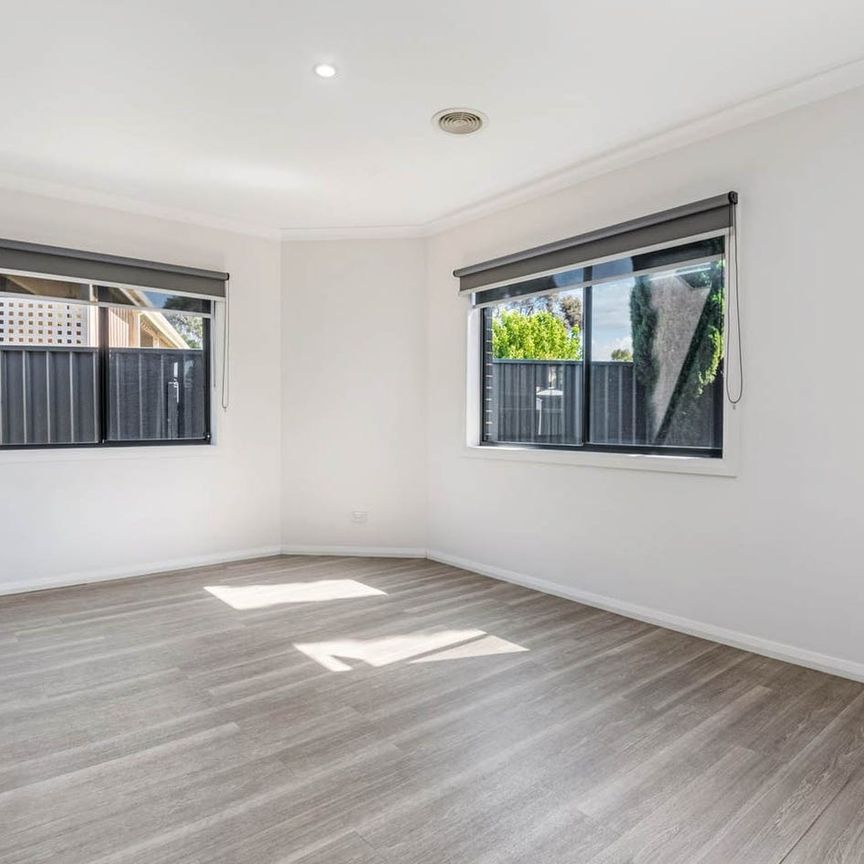 Modern & Comfortable Three-Bedroom Home with Easy Living Appeal - Photo 1