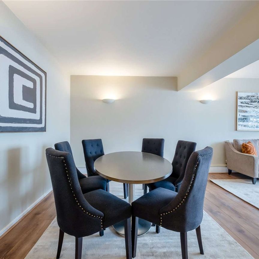 This large, bright and spacious two bedroom apartment is on the 6th floor and is located in the heart of Victoria. - Photo 1