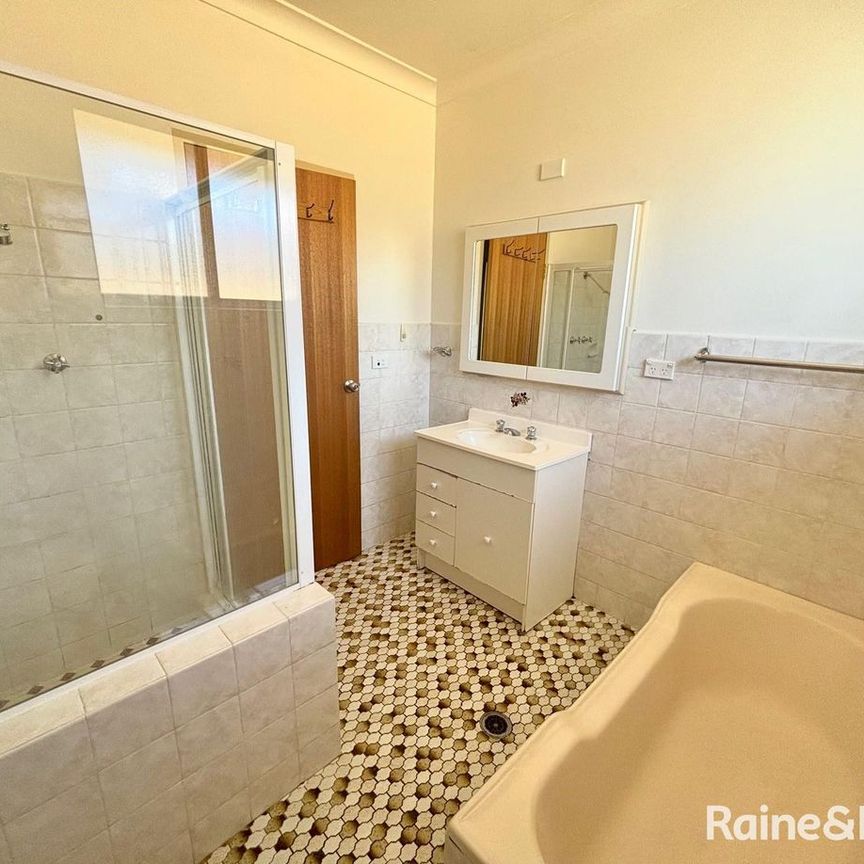 Spacious 2-Bedroom Unit in Prime Location - Photo 1