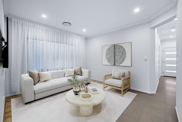 Your Ideal Family Home in the Heart of Oran Park - Photo 1