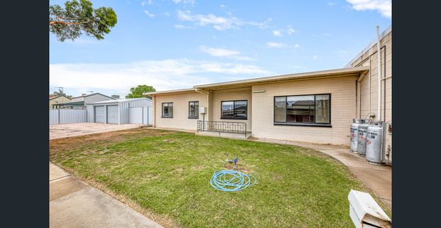 Neat Family Home - Photo 1