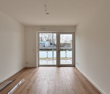 Neubau-Erstbezug! Schicke 2-Zimmerwohung mit großer Dachterrasse! - Photo 6