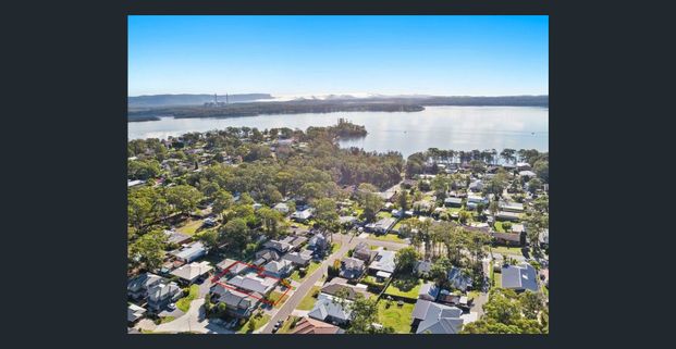 Spacious 4-Bedroom Home Offering Comfort, Style & Lakeside Convenience - Photo 1