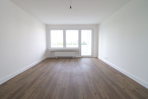 Modernes Flair in grüner Wohnanlage! - Foto 1