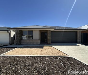 Modern Family Living in the Heart of Munno Para Downs - Photo 5