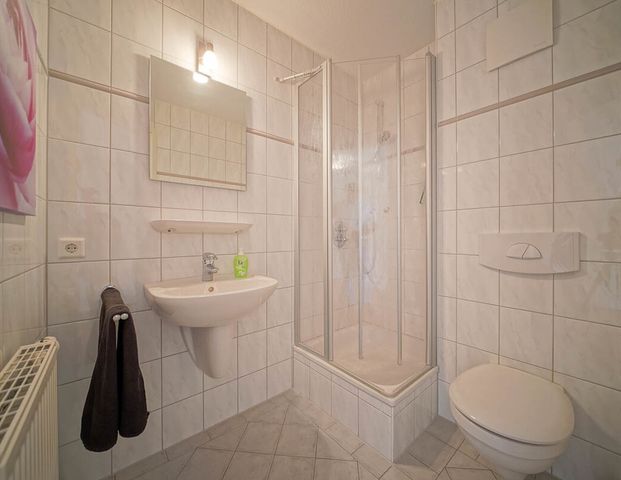 Attraktive 3-Zimmer-Wohnung mit Balkon und EBK in Bad Zwischenahn - Foto 1