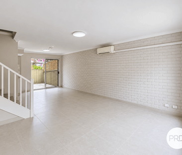 Fully Renovated 3-Bedroom Townhouse - Photo 3