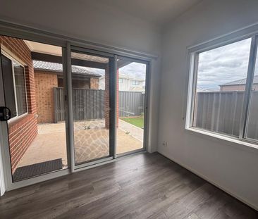 Modern Comforts Await in This 4-Bedroom, 2-Bathroom Home - Photo 5