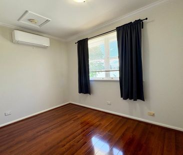 Walk to Eastwood Station – Full-Brick 4 Bedroom Home - Photo 6
