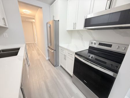 Updated and Bright Corner Unit Two Bedroom in Convenient Lougheed Area - Photo 5