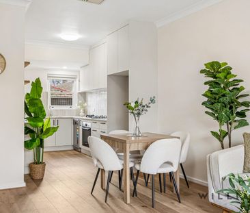 STYLISHLY RENOVATED LIVING IN PRESTIGIOUS TUSMORE! - Photo 4