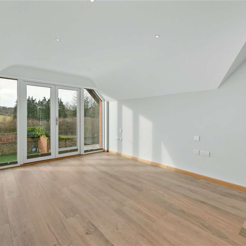 An exceptional newly done four bedroom barn conversion, providing an idyllic countryside setting and spacious and contemporary living accommodation. - Photo 1