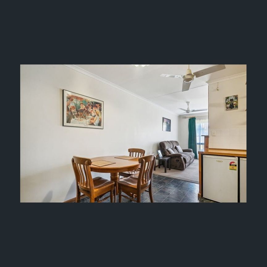 Well maintained single story unit. - Photo 1