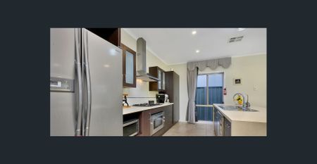 Spacious Modern Family Home with Alfresco and Solar Panels - Photo 4