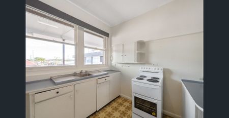 Located above the takeaway shop - For Inspections walk down the driveway, turn left and up the stairs to flat 2 - Photo 2