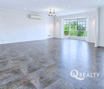Spacious Lowset Brick Home with 4 Bedrooms - Photo 3