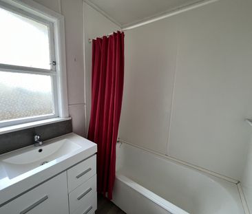 Inviting two-bedroom unit tucked away from the main road down a ser... - Photo 5