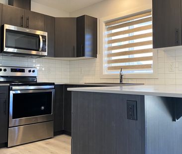 Modern 3 Storey Townhome | Double Attached Garage | Altius Tamarack - Photo 4